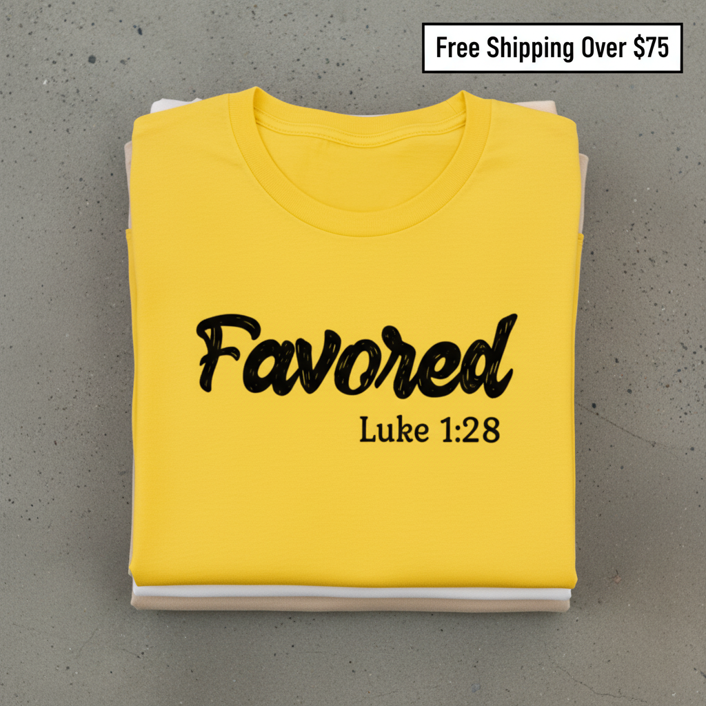 Favored Luke 1:28 T-Shirt_stacked_flatlay