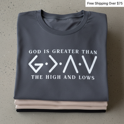 God Is Greater T-Shirt_stacked_flatlay