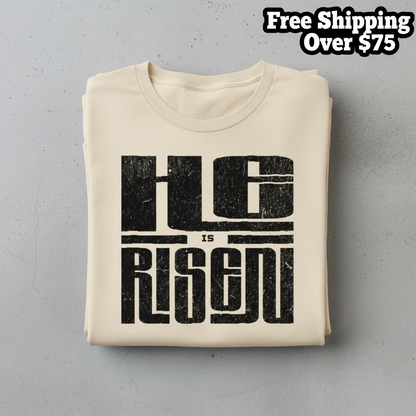 He Is Risen T-Shirt_stacked_flatlay