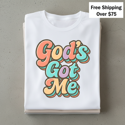 God's Got Me T-Shirt_stacked_flatlay