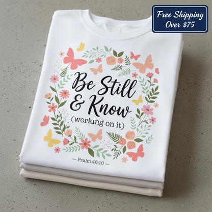 Be Still & Know T-Shirt_stacked_flatlay